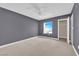 Bedroom with grey walls, ceiling fan and a large closet at 8000 W Badura Ave # 2106, Las Vegas, NV 89113
