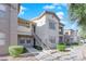 Condo building exterior with walkway and landscaping at 8000 W Badura Ave # 2106, Las Vegas, NV 89113