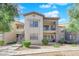 Two-story building exterior with landscaping and stairs at 8000 W Badura Ave # 2106, Las Vegas, NV 89113