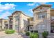 Two-story building exterior with landscaping and stairs at 8000 W Badura Ave # 2106, Las Vegas, NV 89113