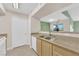 Bright kitchen features stainless steel appliances and light wood cabinets at 8000 W Badura Ave # 2106, Las Vegas, NV 89113