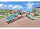 playground with slides and climbing structures at 8000 W Badura Ave # 2106, Las Vegas, NV 89113