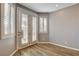 Bright entryway with wood-look floors and neutral walls at 10221 Crystal Arch Ave, Las Vegas, NV 89129