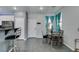 Small dining area with glass table and metal chairs at 10437 Lyric Arbor Dr, Las Vegas, NV 89135