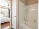Bathroom with a shower over tub combination, and adjacent bedroom at 2120 Ramrod Ave # 1112, Henderson, NV 89014