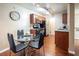 Charming kitchen with stainless appliances, granite counters, and a cozy dining area at 2120 Ramrod Ave # 1112, Henderson, NV 89014