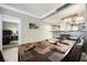 Dining area showcasing an inviting table setup, adjacent to a bedroom and kitchen, perfect for comfortable living at 230 E Flamingo Rd # 212, Las Vegas, NV 89169