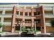 Complex facade with a beautiful fountain, plants and a courtyard at 230 E Flamingo Rd # 212, Las Vegas, NV 89169
