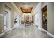 Grand foyer with marble flooring, decorative ceiling, and elegant furnishings creating a luxurious entrance at 230 E Flamingo Rd # 212, Las Vegas, NV 89169