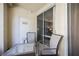 Enclosed patio with seating, offering a spot for relaxing and enjoying the outdoors in a private, tranquil setting at 230 E Flamingo Rd # 212, Las Vegas, NV 89169