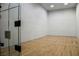Spacious racquetball court with hardwood floors and high ceilings, perfect for recreational play at 230 E Flamingo Rd # 212, Las Vegas, NV 89169