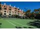 Well-maintained tennis court, surrounded by lush landscaping in a desirable community at 230 E Flamingo Rd # 212, Las Vegas, NV 89169