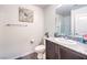 Bathroom featuring modern granite countertop and shower with glass door at 2657 Champagne Gold Ave, North Las Vegas, NV 89086