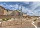 Modern playground with climbing net, landscaping and ample space for outdoor play at 2657 Champagne Gold Ave, North Las Vegas, NV 89086