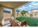 Landscaped backyard with artificial turf at 3094 Isle Dr, Las Vegas, NV 89141