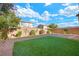 Spacious backyard with artificial grass at 3094 Isle Dr, Las Vegas, NV 89141
