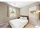 Cozy bedroom with neutral decor, window coverings and ample light at 3094 Isle Dr, Las Vegas, NV 89141