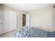 Bright bedroom with double doors and carpet flooring at 3094 Isle Dr, Las Vegas, NV 89141