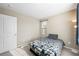 Well-lit bedroom featuring a comfortable bed and ample space at 3094 Isle Dr, Las Vegas, NV 89141