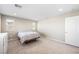Well-lit bedroom with carpeted floor and large window at 3094 Isle Dr, Las Vegas, NV 89141