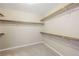 Large walk-in closet with double hanging rods and shelves at 3094 Isle Dr, Las Vegas, NV 89141