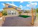 Two-story house exterior with backyard view at 3094 Isle Dr, Las Vegas, NV 89141