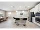 Modern kitchen with white cabinets, island, and stainless steel appliances at 3094 Isle Dr, Las Vegas, NV 89141