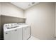 Laundry room complete with washer and dryer at 3094 Isle Dr, Las Vegas, NV 89141