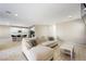 Open living room showcasing a kitchen view and comfortable seating at 3094 Isle Dr, Las Vegas, NV 89141