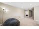 Open loft area with plush beanbag chair and access to bedroom at 3094 Isle Dr, Las Vegas, NV 89141