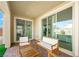 Relaxing covered patio with seating area at 3094 Isle Dr, Las Vegas, NV 89141