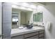 Bathroom with a modern vessel sink and vanity with mosaic tile accents at 3146 Bel Air Dr, Las Vegas, NV 89109