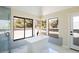 Relaxing bathroom features a soaking tub next to big windows and shower with glass door at 3146 Bel Air Dr, Las Vegas, NV 89109