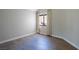 Cozy bedroom with wood flooring and large window with curtains and natural light at 3146 Bel Air Dr, Las Vegas, NV 89109