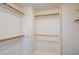 Walk-in closet with shelves and hanging rods, providing ample storage space at 3146 Bel Air Dr, Las Vegas, NV 89109