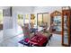 Bright dining room features a glass dining table, six chairs, and patio doors at 3146 Bel Air Dr, Las Vegas, NV 89109