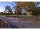 Scenic view of lush golf course, framed by mature trees, creating a tranquil and picturesque backdrop at 3146 Bel Air Dr, Las Vegas, NV 89109
