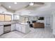Modern kitchen featuring stainless steel appliances and leading to a living space at 3146 Bel Air Dr, Las Vegas, NV 89109