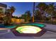 Inviting backyard pool and hot tub, surrounded by lush greenery, providing a serene and private oasis at 3146 Bel Air Dr, Las Vegas, NV 89109