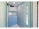 Contemporary shower featuring sleek glass doors and rainfall showerhead at 3146 Bel Air Dr, Las Vegas, NV 89109