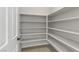 Walk-in pantry with ample shelving at 54 Barton Bay Ave, North Las Vegas, NV 89031