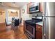 Kitchen boasts stainless steel appliances and an adjacent dining area at 2120 Ramrod Ave # 1112, Henderson, NV 89014