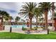 Resort-style community pool area featuring a large pool, lounging areas, and lush landscaping at 305 Via Del Duomo, Henderson, NV 89011
