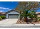 Charming single-story home with a two-car garage and low-maintenance desert landscaping at 3591 Driving Range St, Las Vegas, NV 89122