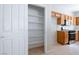 Spacious pantry with shelving and cabinets, located adjacent to the kitchen area at 3591 Driving Range St, Las Vegas, NV 89122