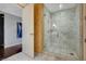 Modern bathroom with glass shower and marble tile at 4471 Dean Martin Dr # 3908, Las Vegas, NV 89103