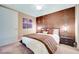 Modern bedroom with a large bed and brown accents at 4471 Dean Martin Dr # 3908, Las Vegas, NV 89103