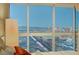 Bedroom with floor-to-ceiling windows showcasing breathtaking city views at 4471 Dean Martin Dr # 3908, Las Vegas, NV 89103