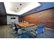 Modern conference room featuring a large wooden table and comfortable seating at 4471 Dean Martin Dr # 3908, Las Vegas, NV 89103