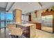 Modern kitchen with granite countertops, stainless steel appliances, and breakfast bar at 4471 Dean Martin Dr # 3908, Las Vegas, NV 89103